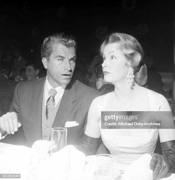 Actress Arlene Dahl and actor Fernando Lamas attend a dinner in Los Angeles, California.