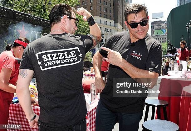 Macy's Culinary Council Chefs Johnny Iuzzini and Todd English attend the 2014 Sizzle Showdown at Macy's Herald Square on June 28, 2014 in New York...