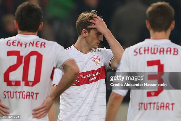 Georg Niedermeier of Stuttgart reacts with his team mates Christian Gentner and Daniel Schwaab after the Bundesliga match between VfB Stuttgart and...