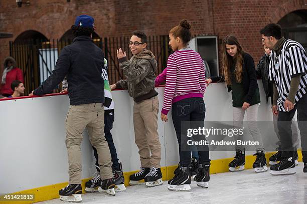 Kids ice skate at the ice rink at McCarren Pool, which opened for the winter months last week, on November 22, 2013 in the Green Point neighborhood...