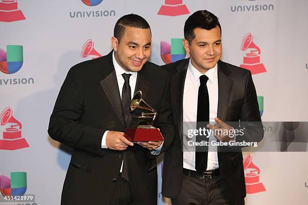 Musicians Felipe Pelaez and Manuel Jullian, winners of Best Cumbia/Vallenato Album for "Diferente," pose in the press room during The 14th Annual...