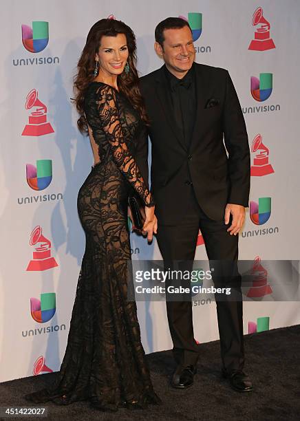 Television personality Cristina Bernal and Alan Tacher pose in the press room during The 14th Annual Latin GRAMMY Awards at the Mandalay Bay Events...