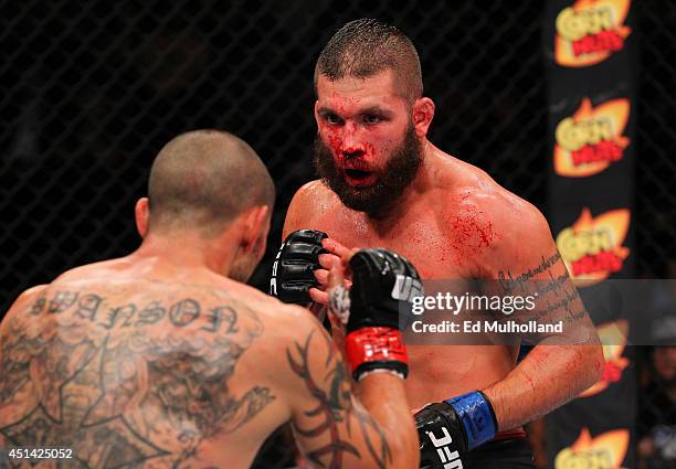 Jeremy Stephens faces off against Cub Swanson in their featherweight bout at the AT&T Center on June 28, 2014 in San Antonio, Texas.