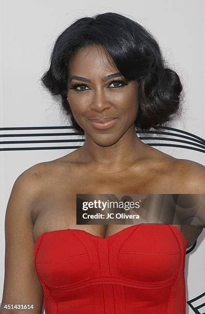 Tv personality Kenya Moore attends "PRE" BET Awards Dinner at Milk Studios on June 28, 2014 in Hollywood, California.