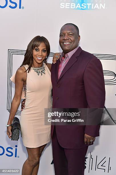 Holly Robinson Peete and Rodney Peete attends the "PRE" BET Awards Dinner at Milk Studios on June 28, 2014 in Hollywood, California.