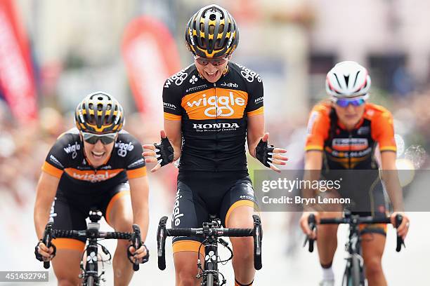 Laura Trott of Wiggle Honda celebrates crossing the finish line to win the Elite Women British National road race championships on June 29, 2014 in...