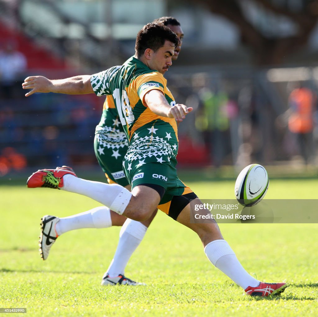Bruce Cook Rugby Sam Vaevae of the Cook Islands kicks the ball upfield during the ...