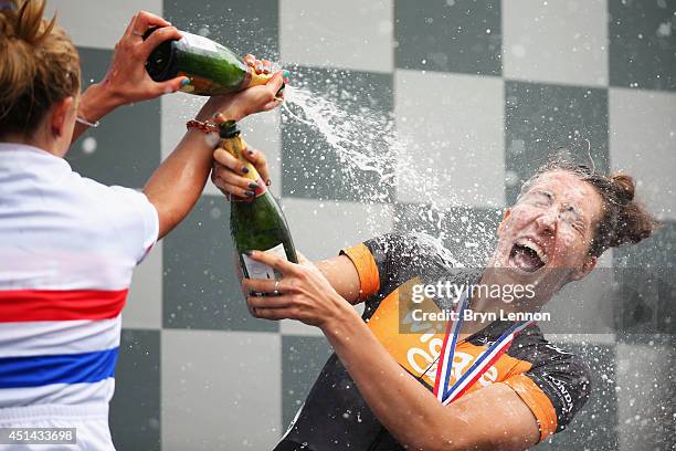 Winner Laura Trott sprays her Wiggle Honda teammate, and runner up, Dani King with champagne on the podium the Elite Women British National road race...