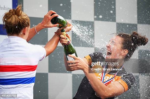 Winner Laura Trott sprays her Wiggle Honda teammate, and runner up, Dani King with champagne on the podium the Elite Women British National road race...