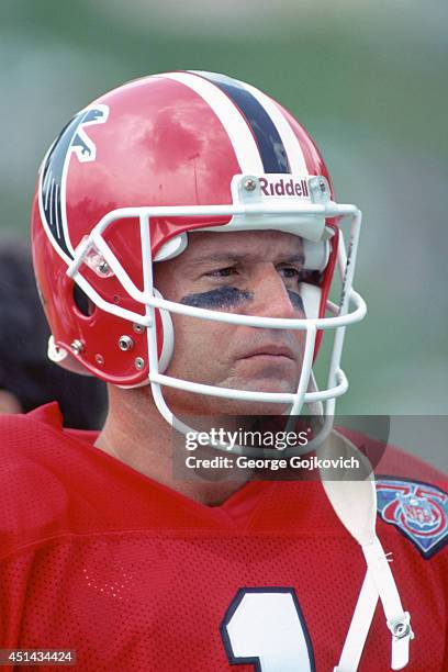 Quarterback Jeff George of the Atlanta Falcons looks on from the sideline during a preseason game against the San Diego Chargers at Fawcett Stadium...