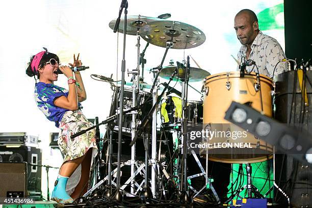 Liliana Saumet and Kike Egurrola of Colombian dance group Bomba Estéreo perform on the Sonic Stage, on the last day of the Glastonbury Festival of...