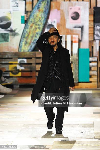Yohji Yamamoto acknowledges the applause of the audience after the Y-3 Spring/Summer 2015 Show as part of Paris Fashion Week Menswear S/S 2015 at...