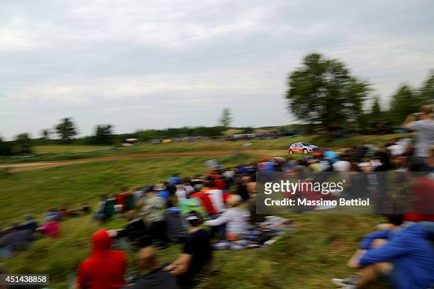Juho Hanninen of Finland and Tomi Tuominen of Finland compete in their Hyundai Motorsport Hyundai i20 WRC during Day Three of the WRC Poland on June...