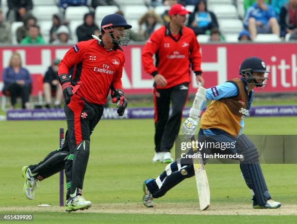 David Wainwright of Derbyshire Falcons is captured out of his crease by Durham Jets wicket keeper Phil Mustard during The Natwest T20 Blast match...