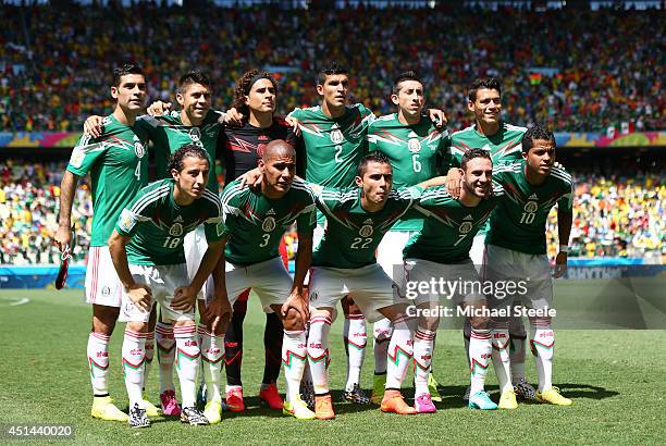 Mexico pose for a team photo prior to the 2014 FIFA World Cup Brazil Round of 16 match between Netherlands and Mexico at Castelao on June 29, 2014 in...