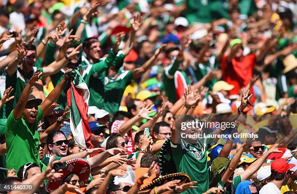 Mexico fans cheer during the 2014 FIFA World Cup Brazil Round of 16 match between Netherlands and Mexico at Castelao on June 29, 2014 in Fortaleza,...