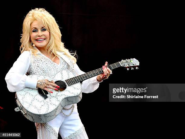 Dolly Parton performs on The Pyramid Stage on Day 3 of the Glastonbury Festival at Worthy Farm on June 29, 2014 in Glastonbury, England.