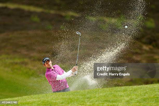 Jamie Elson of England plays out of a bunker at the ninth on day four of the 2014 Scottish Hydro Challenge hosted by Macdonald Hotels & Resorts at...
