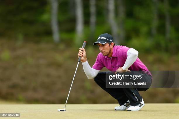 Jamie Elson of England lines up a putt on day four of the 2014 Scottish Hydro Challenge hosted by Macdonald Hotels & Resorts at Spey Valley Golf...