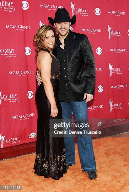 Adrianne Leon and Chris Young during 42nd Academy of Country Music Awards - Red Carpet at The MGM Grand Hotel and Casino Resort in Las Vegas, Nevada.