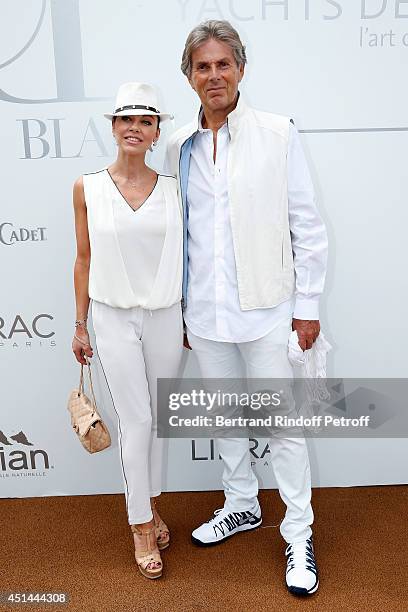 President of Barriere Group Dominique Desseigne and dancer Alexandra Cardinale attend the 'Brunch Blanc' hosted by Barriere Group on June 29, 2014 in...