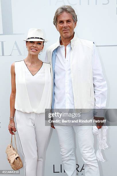 President of Barriere Group Dominique Desseigne and dancer Alexandra Cardinale attend the 'Brunch Blanc' hosted by Barriere Group on June 29, 2014 in...