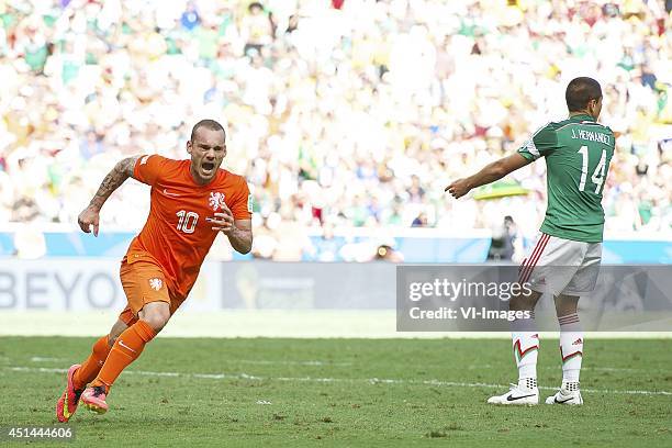 Wesley Sneijder of Holland, Javier Hernandez of Mexico during the 1/8 final match between The Netherlands and Mexico on June 29, 2014 at Estadio...