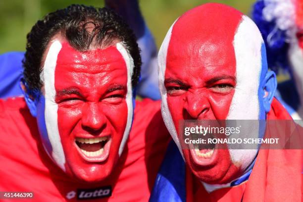 Costa Rica's fans cheer for their team as they arrive to attend the round of 16 football match between Costa Rica and Greece at Pernambuco Arena in...