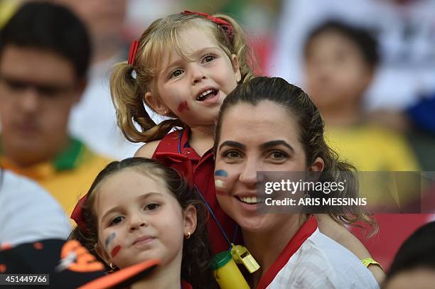 Costa Rica's fans pose before the start of the Round of 16 football match between Costa Rica and Greece at Pernambuco Arena in Recife during the 2014...