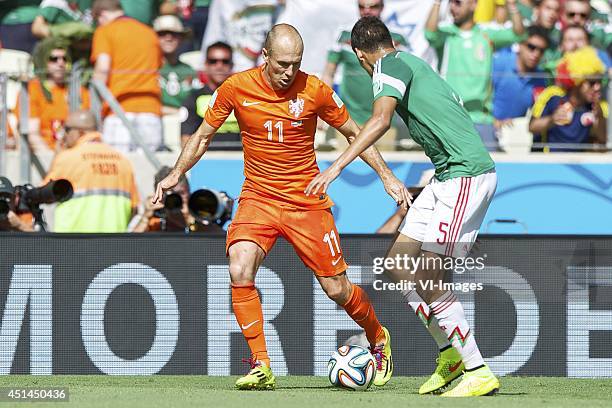 Arjan Robben of Holland, Diego Reyes of Mexico during the 1/8 final match between The Netherlands and Mexico on June 29, 2014 at Estadio Castelao in...