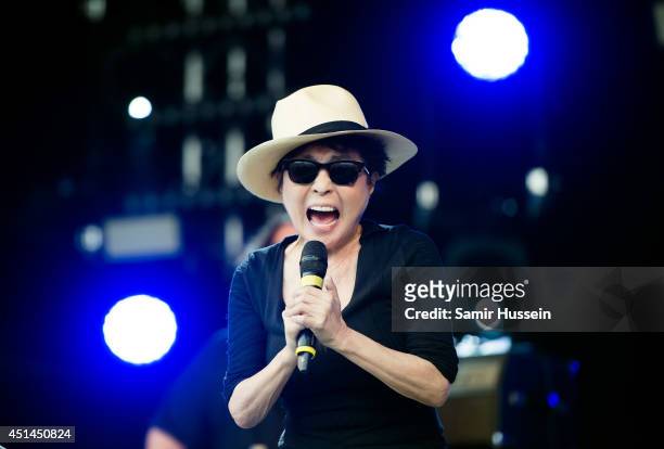 Yoko Ono of the Plastic Ono Band performs on the Park stage on Day 3 of the Glastonbury Festival at Worthy Farm on June 29, 2014 in Glastonbury,...