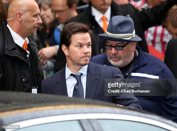 Mark Wahlberg sighted departing the 'Transformers: Age of Extinction' Premiere at the Sony Center on June 29, 2014 in Berlin, Germany.