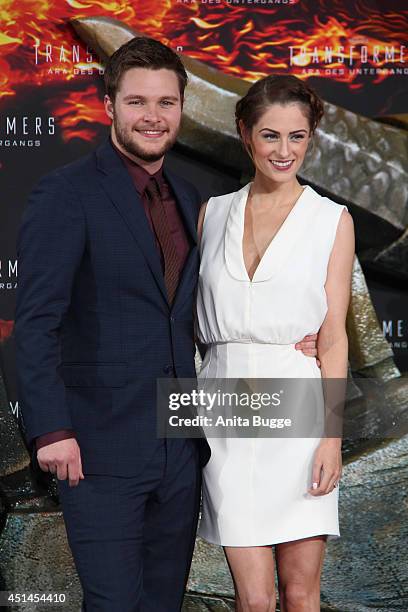 Actor Jack Reynor and Madeline Mulqueen attend the premiere of the film 'Transformers: Age of Extinction' at Sony Centre on June 29, 2014 in Berlin,...