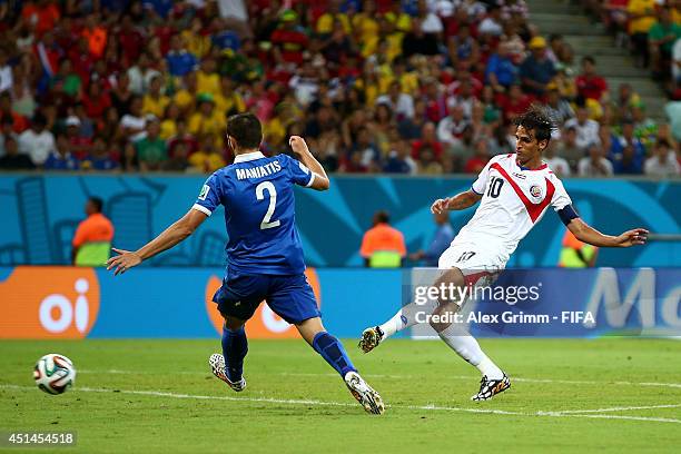 Bryan Ruiz of Costa Rica scores his team's first goal during the 2014 FIFA World Cup Brazil Round of 16 match between Costa Rica and Greece at Arena...