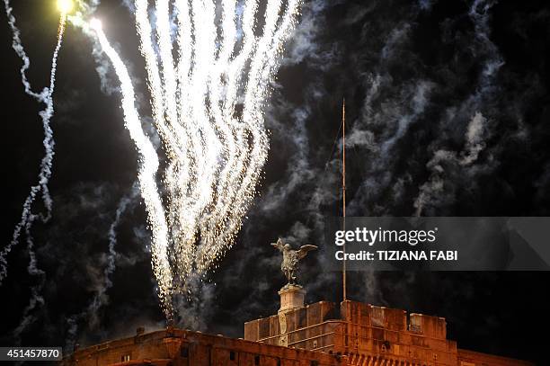 General view shows fireworks over the Castel Sant'Angelo during the traditional 'Girandola' the feast of Romes patron St Peter and Paul, on June 29,...