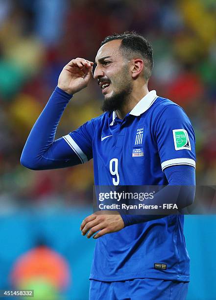 Konstantinos Mitroglou of Greece reacts during the 2014 FIFA World Cup Brazil Round of 16 match between Costa Rica and Greece at Arena Pernambuco on...