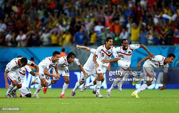 Costa Rica players celebrate the win after a penalty shootout during the 2014 FIFA World Cup Brazil Round of 16 match between Costa Rica and Greece...