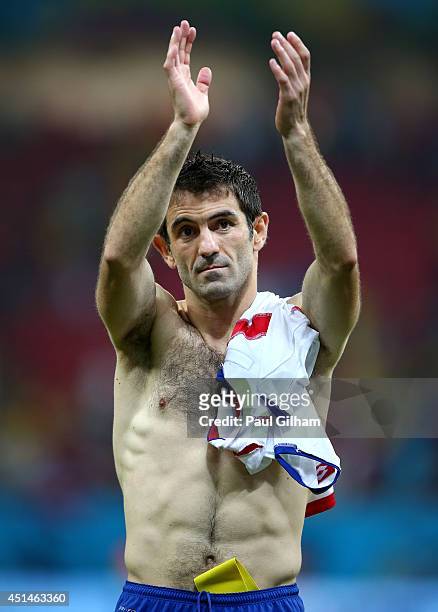 Giorgos Karagounis of Greece acknowledges the fans after being defeated by Costa Rica in a penalty shootout during the 2014 FIFA World Cup Brazil...