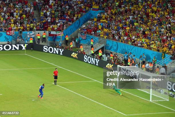 Keylor Navas of Costa Rica saves a penalty kick by Theofanis Gekas of Greece during the 2014 FIFA World Cup Brazil Round of 16 match between Costa...