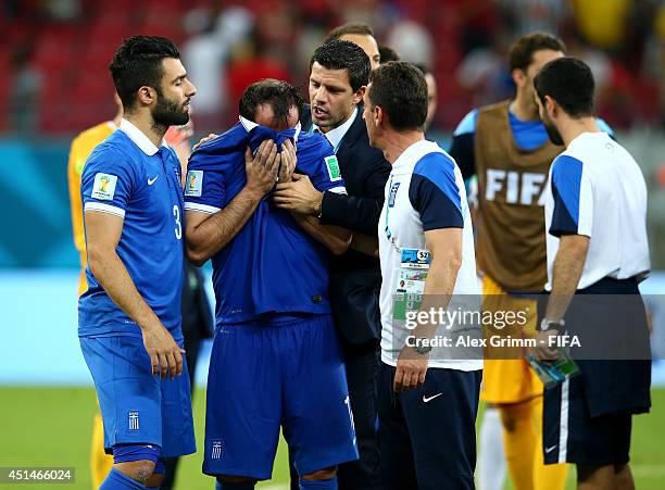 Theofanis Gekas reacts after the defeat in the 2014 FIFA World Cup Brazil Round of 16 match between Costa Rica and Greece at Arena Pernambuco on June...