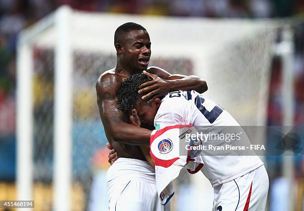 Waylon Francis and Jose Miguel Cubero of Costa Rica celebrate victory after the 2014 FIFA World Cup Brazil Round of 16 match between Costa Rica and...