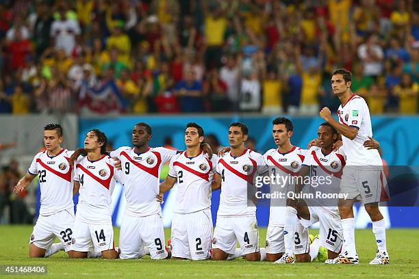Jose Miguel Cubero, Randall Brenes, Joel Campbell, Johnny Acosta, Michael Umana, Giancarlo Gonzalez, Junior Diaz and Celso Borges of Costa Rica look...