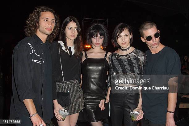 The Pepper Brothers, Shep and Jamo with models Rachael Robinson, Lily McMenamy and Lida Fox attend the Saint Laurent show as part of the Paris...