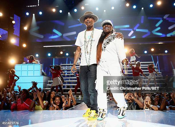 Recording artists Pharrell Williams and Missy Elliott perform onstage during the BET AWARDS '14 at Nokia Theatre L.A. LIVE on June 29, 2014 in Los...