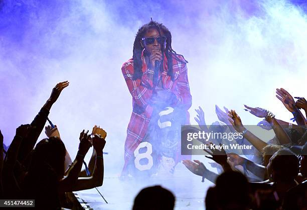 Rapper Lil Wayne performs onstage during the BET AWARDS '14 at Nokia Theatre L.A. LIVE on June 29, 2014 in Los Angeles, California.