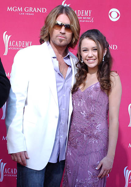 Billy Ray Cyrus and daughter Miley Cyrus during 41st Annual Academy of Country Music Awards - Arrivals at MGM Grand in Las Vegas, Nevada, United...