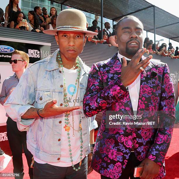 Recording artist Pharrell Williams and rapper Wale attend the BET AWARDS '14 at Nokia Theatre L.A. LIVE on June 29, 2014 in Los Angeles, California.