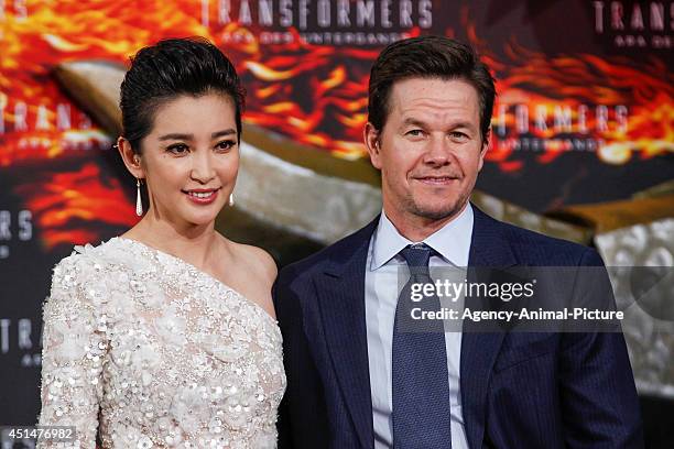 Li Bingbing and Mark Wahlberg attend the 'Transformers: Age of Extinction' Berlin Premiere on June 29, 2014 in Berlin, Germany.