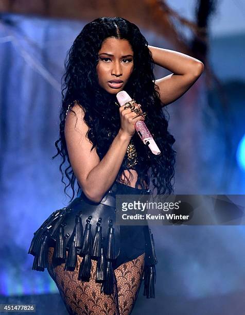 Singer Nicki Minaj performs onstage during the BET AWARDS '14 at Nokia Theatre L.A. LIVE on June 29, 2014 in Los Angeles, California.