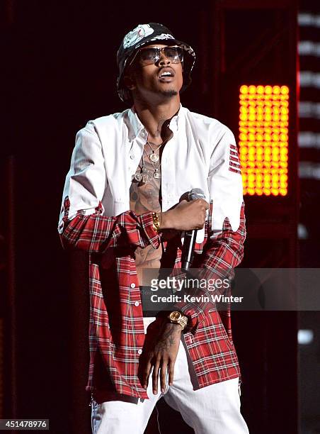 Singer August Alsina performs onstage during the BET AWARDS '14 at Nokia Theatre L.A. LIVE on June 29, 2014 in Los Angeles, California.